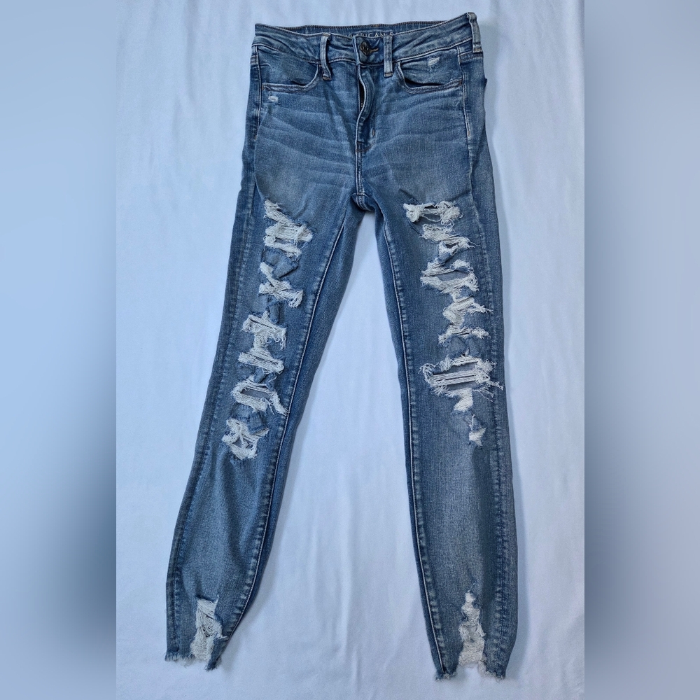 American Eagle NE(X)T LEVEL STRETCH Distressed Blue Jeans